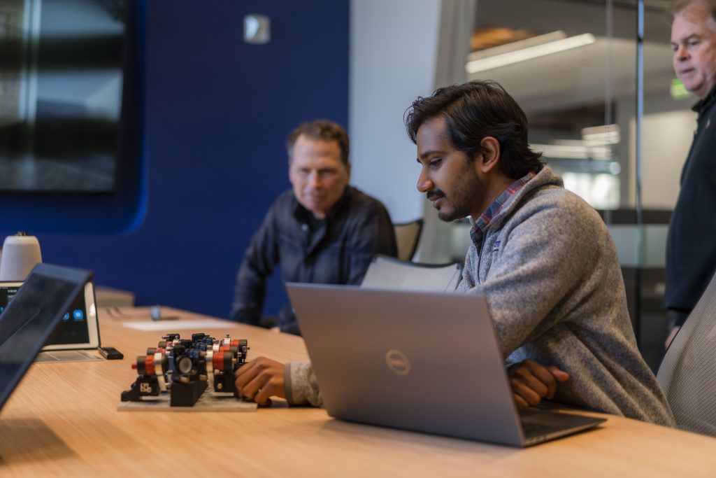 Team of Gener8 product development engineers working together